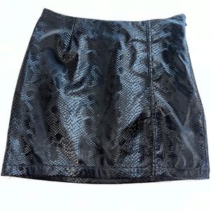 Size xs Juicy Couture snake skin faux leather skirt.